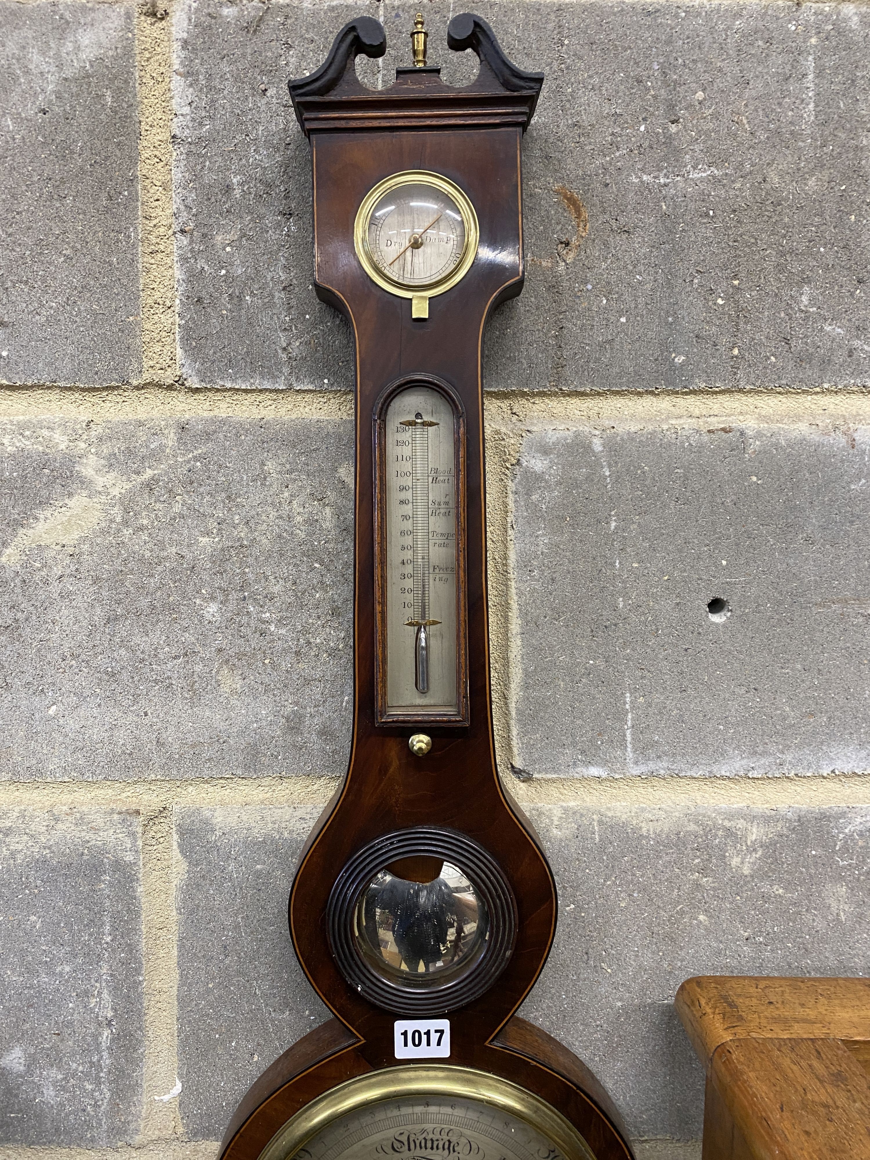 An early 19th century mahogany wheel barometer marked Beffi, Hastings, height 96cm